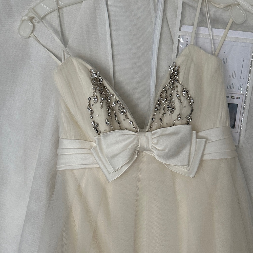 Cream wedding gown with train
